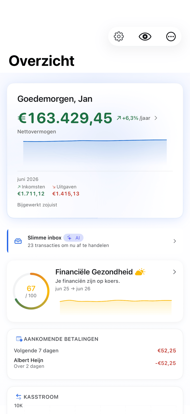 Net worth and monthly cash flow dashboard on iPhone
